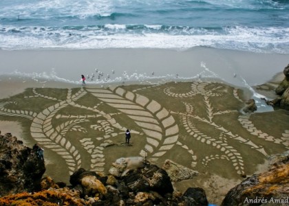 Artista desenha gigantescas obras de arte na areia