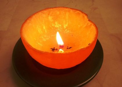 Aprenda a fazer uma vela com a casca da laranja